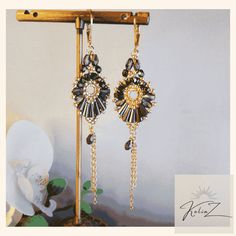 Awesome! Amazing! Our latest arrival. Miguel Ases style earrings,Gold black purple chandelier earrings, Drop crystal chain earrings at €89.00. #24KFittings #BeadedEarrings #LongBrightEarring #DesignerJewelry #ModernEarrings #EarringsChains #BlackPurple #WristJewelry #GoldPlated #LuxuryFittings Elegant Beaded Chain Drop Earrings, Elegant Beaded Chain Earrings, Elegant Beaded Chain Dangle Earrings, Elegant Beaded Chain Earrings For Party, Beaded Dangle Crystal Earrings For Evening, Elegant Crystal Earrings With Dangling Beads, Elegant Black Beaded Chandelier Earrings, Elegant Beaded Metal Crystal Earrings, Handmade Evening Chandelier Dangle Earrings