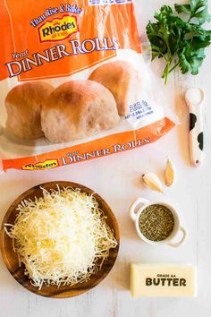 ingredients to make dinner rolls laid out on a table