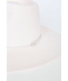 Our Cream London is made from 100% Australian wool felt. It features a genuine leather trim with double knots and a sewn turned brim and an amazing fit. This color is available in size medium with a ribbon size adjuster tucked into the sweatband allows you to size down to small. Founded by husband-and-wife duo Michael Hagen and Hedda Staines, Wyeth is inspired by the laid-back lifestyle of the California coast. Trendy takes on classic designs make this versatile line of hats a go-to for premium Felt Fedora, California Coast, Wool Felt, Leather Trims, Fedora, Classic Design, Genuine Leather, Felt, Ribbon