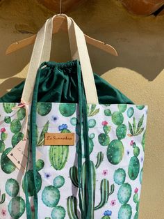 CACTUS BAG Summerbags are good mood bags, designed for the beach but perfect to use in your free time too! Handcrafted by Cristina in her workshop in Sardinia, with reinforced and resistant materials, to ensure a durable product over the years! They have two internal pockets to quickly find keys and small objects and an anti-sand closure with double drawstring! Very roomy and practical to be folded and carried in a suitcase! You can choose the single bag, the normal set (consisting of a bag, min Green Canvas Shoulder Bag For Beach, Large Capacity Summer Shoulder Bag As Gift, Summer Shoulder Bag With Large Capacity, Green Canvas Bag For Summer Vacation, Green Canvas Bags For Summer, Summer Shoulder Bag With Adjustable Strap As Gift, Casual Green Bag As Gift, Handmade Casual Beach Bag For Daily Use, Large Capacity Beach Bag As Summer Gift