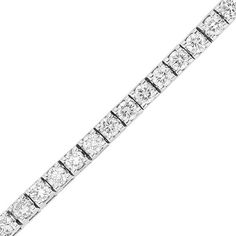 Thrill her with the wearable luxury of this shimmering diamond tennis bracelet. Crafted in cool 14K white gold, this extraordinary streamlined design features dazzling 1/8 ct. diamonds, each with a color rank of I and clarity of I1. Captivating with 6 ct. t.w. of diamonds and a bright polished shine, this stylish 7.0-inch tennis bracelet closes securely with a box clasp. Timeless White Diamond Bracelet In Platinum, Timeless White Diamond Platinum Bracelet, White Diamond Bracelet With Brilliant Cut, Timeless White Diamond Bracelet With Brilliant Cut, White Brilliant Cut Diamond Bracelet, Modern Diamond Tennis Bracelet For Formal Occasions, White Timeless Diamond Bracelet With Single Cut Diamonds, Timeless White Diamond Bracelet With Single Cut Diamonds, Timeless White Diamond Bracelet With Single Cuts