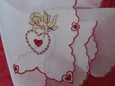 CUPID & HEARTS VALENTINE Handkerchief This lovely feminine white cotton handkerchief tenderly focuses on an adorable Cupid with his hearts and arrows. Embroidered in gorgeous red hearts and scalloped border. Measures 11 x 11 inches. Spotlessly clean. Excellent condition. So pretty! For your valentine. White Handkerchiefs For Spring Gifts, White Handkerchiefs As Spring Gifts, Spring Gift White Handkerchiefs, Summer White Handkerchiefs Gift, Scalloped Border, Irish Wedding, Red Hearts, Pretty Rings, Silver Cuff Bracelet