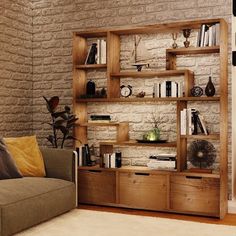 a living room with a couch, book shelf and bookshelf on the wall