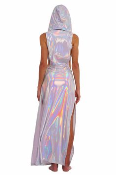 Step into the spotlight and unleash your inner goddess with the Atlantis holographic white maxi dress. Made with lightweight, prismatic spandex that gently hugs your curves and drapes beautifully, this dress shimmers and shines as you move, capturing everyone's attention. Whether you're dancing under the stars or soaking up the sun, this festival maxi dress is guaranteed to elevate your ethereal vibes. FEATURES: Maxi Length High side slits for ease of movement Cowl neck with voluminous hoodie Sl Iridescent Clothing, Diamond Suit, Futuristic Dress, Holographic Dress, Festival Dresses, Rave Dress, Grecian Dress, Resort Wear Dresses, Rave Party