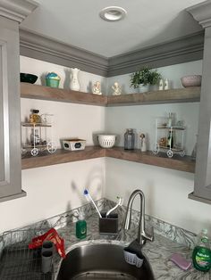 the kitchen sink is clean and ready to be used for cleaning dishes, cups, and utensils