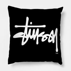 a black and white pillow with the word typoy printed in white on it