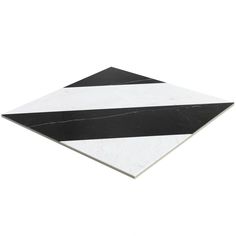 a black and white square shaped tile with diagonal stripes on the bottom, set against a white background