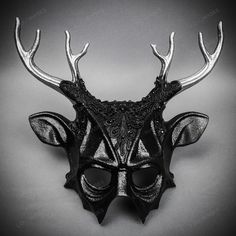 Mystery And Allure With Our Antler Deer Textured Horns With Laces Devil Halloween Masquerade Mask In Black. Perfect For Anyone Seeking An Unforgettable Halloween Costume Or Masquerade Accessory, This Mask Combines The Wild Elegance Of Antler Deer Horns With The Mysterious Charm Of A Masquerade. Crafted From Durable Plastic, The Mask Features A Textured Design That Mimics The Aged Look Of Antique Artifacts, Painted In A Popcorn Textured Black To Enhance Its Appeal. Measuring Approximately 14 Inch Dark Masquerade Mask, Goth Masquerade Mask, Gothic Horned Masquerade Mask For Costume Party, Horned Masquerade Mask For Halloween, Gothic Black Masquerade Mask For Halloween, Punk Masquerade Mask For Halloween Party, Punk Style Masquerade Mask For Halloween Party, Punk Style Halloween Masquerade Mask For Party, Fantasy Horned Masks And Prosthetics For Party