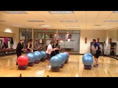 people are doing exercises on exercise balls in the gym