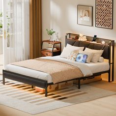 a bed sitting on top of a hard wood floor next to a wooden dresser and window