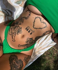 Feminine Tattoos With Meaning, Feminine Lion Tattoo, Lower Stomach Tattoos For Women, Lion Tattoo Ideas, Lower Belly Tattoos, Side Stomach Tattoos, Abdomen Tattoo, Belly Button Tattoo, Lower Stomach Tattoos