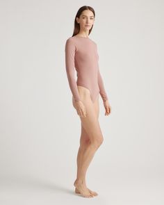 Modern and timeless, this versatile base layer can be easily dressed up or down in a snap. Slip it on under our Washable Silk Skirt for a simple wow factor or pair it with jeans for a casual, laidback look. With full coverage and supportive stretch, our Stretch Cotton Jersey Long Sleeve Bodysuit checks all the boxes.  | Quince | Women's Stretch Cotton Jersey Long Sleeve Bodysuit in Rose, Size XS, Organic Cotton Jersey Long Sleeve, Great Lengths, Wow Factor, Size 8 Dress, Silk Skirt, Collar Blouse, Long Sleeve Bodysuit, Crew Neck Tee, Base Layer