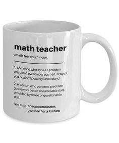 a white coffee mug with the definition of a math teacher written in black on it