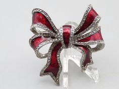 "Beautiful Vintage LG Silver Tone Red Enamel Bow Tie Pin Brooch. The piece is in excellent condition. It is 2\" wide and 1 3/4\" tall. Comes ready to wear. Free Shipping!" Vintage Red Brooches For Formal Occasions, Red Enamel Brooch For Gift, Red Enamel Brooch Gift, Red Enamel Brooch Jewelry, Vintage Ribbon Brooches As Gift, Red Enamel Brooches For Gift, Red Enamel Brooches As Gift, Vintage Red Enamel Brooches, Red Enamel Vintage Brooch