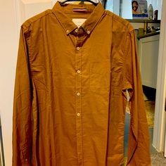 Brown Brunswick Fabrics Button Down, Slim Fit Sz L. Bought It Brand New And Have Never Worn It. Brown Button-up Everyday Shirt, Brown Button-up Shirt For Everyday, Brown Everyday Button-up Shirt, Cotton Button-up Plain Shirt, Everyday Brown Button-up Shirt, Plain Cotton Button-up Shirt, Brown Everyday Collared Shirt, Everyday Brown Shirt With Buttons, Brown Cotton Tops With Buttons