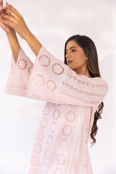 Featuring a chalk pink kurta set in cotton schiffli base detailed with laces. It is paired with matching pants and solid dupatta. Color: CHALK PINK FABRIC: COTTON SCHIFFLI Delivery time 15 to 20 days Schiffli Kurta, Look Wide Leg, Kurta Set With Dupatta, Pink Kurta, Pink Wrap, Matching Pants, Thread Work, Kurta Set, Pink Fabric