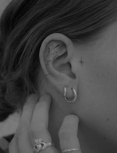 a woman with ear piercings on her ears