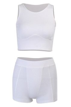 The Hensely Lounge Set is a matching lounge set with underbust and front seam details. Made from 70% Cotton 30% Polyester Stretchy Ribbed Fabric Cropped and Form Fit Model is 5'10" with measurements 34" 27" 36" wearing a size small Eco friendly made to order piece, please allow 6-14 day for processing. Fitted Solid Two-piece Loungewear Set, Fitted Two-piece White Top, Fitted White Two-piece Top, Fitted Seamless Cropped Bottoms, Fitted Two-piece Solid Top, Fitted Loungewear Two-piece Set, White Fitted Crop Top With Seamless Construction, Fitted White Two-piece Set, Stretch Cropped Loungewear Set