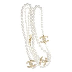 Chanel Vintage 2017 100 Year Anniversary Extra Long White Pearls Trio Pendant CC Logo Coco Strands Layers Versatile Necklace Belt Bracelet, Gold Tone Very classic versatile necklace. Can be worn as many different style. Even can be worn as a belt and bracelet. Very excellent condition. Different size faux pearls. 100% Genuine. Signed at clasp. Rare to find. High value collection. Size: 160 cm, extend chain: 3cm. Pendant: 3.7* 2.6 cm. Weight: 168 g. _ _ _ Great for everyday wear. Come with velvet Modern Luxury Channel Set Jewelry, Luxury White Long Pearl Necklace, Luxury Vintage Long Necklace, Luxury Pearl Long Necklace With Chain, Luxury Vintage Pearl Necklace, Chanel Classic Pearl Necklace, Chanel Pearl Necklace, Chanel Pearl Necklace 1stdibs, Chanel Vintage