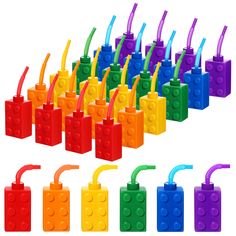 many different colored lego blocks with toothbrushes sticking out of the top and bottom