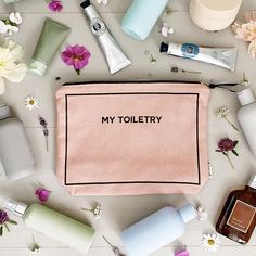 My Toiletry Case Pink surrounded by bathroom products and flowers. Packing Bags Travel, Travel Gift Set, Toothbrush Case, Travel Bag Organization, Packing Jewelry, Toiletry Pouch, Pouch Organizer, Beauty Case, Travel Toiletries