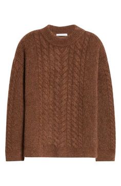 The Danish designer's signature mixture of texture and shape is at its cozy best in this roomy cable-knit sweater made from a rich blend with warm mohair and wool yarns. 27" length (size Medium) Crewneck Long sleeves Ribbed cuffs and hem 38% mohair, 30% wool, 29% polyamide, 3% elastane Dry clean or machine wash, dry flat Imported Designer Clothing Elegant Oversized Cable Knit Sweater, Elegant Brown Cable Knit Sweater, Brown Acrylic Cable Knit Sweater, Fall Mohair Cable Knit Sweater, Cozy Mohair Sweater With Cable Knit, Brown Wool Chunky Knit Cardigan, Brown Merino Wool Fine Knit Sweater, Oversized Mohair Cable Knit Sweater, Cozy Mohair Cable Knit Sweater