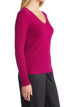 Stay warm in this luxuriously soft cashmere sweater fashioned in a relaxed, easy-to-layer fit. V-neck Long sleeves 100% cashmere Dry clean Imported Elegant Fitted Cashmere V-neck Sweater, Fitted Cashmere V-neck Sweater, Classic Long Sleeve Cashmere V-neck Sweater, Long Sleeve Cashmere V-neck Sweater With Soft Knit, Cashmere Soft Knit Long Sleeve V-neck Sweater, Catching Up With Friends, London Accessories, Layered Fits, Concert Looks