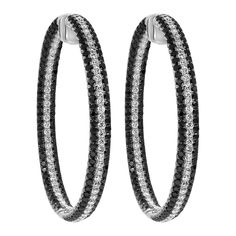 A unique and well crafted pair of hoop earrings showcasing alternating pave set black and white round diamonds set in the inside and outside. Black round diamonds weighs 6.30 carat total, White round diamonds weighs 3.30 carat total. Approximately 2 inches in diameter, Made in 18K White Gold. Roman Malakov is a custom house, specializing in creating anything you can imagine. If you would like to receive a special quote on a custom piece please message or call us. Luxury Black Round Diamond Earrings, Luxury Round Black Diamond Earrings, Luxury Black Diamond Round Earrings, Black Diamond Round Earrings, Luxury Black Hoop Jewelry, Pave Hoop Earrings, Pave Jewelry, Round Diamond Setting, Total Black