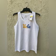 Nike Women Ucla Tank Top Size Small White (Dq1645-100). Brand New With Tags Women Ucla Tank Top Size:Small 100 % Cotton Packages Are Usually Shipped Within 3 To 5 Business Days. Everything You See In The Photo You Will Get In The Same Condition You See It In. If You Got Any Questions Or Any Offers Shoot A Dm. Need More Pictures? Dm Me We Answer Within 12 Hours. Nike Casual Tank Top For Summer, Casual White Nike Tank Top, Yellow Sports Tank Top For Spring, Yellow Tank Top For Sports In Spring, Nike Casual Cotton Tank Top, White Casual Nike Tank Top, Yellow Nike Tops For Summer, Yellow Nike Summer Tops, Nike Yellow Summer Tops