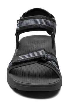 A countoured footbed supports a sporty open toe sandal that is created with Lycra cushioned adjustable straps. Adjustable hook-and-loop closure straps Arch support footbed Textile upper and lining/synthetic sole Imported Sporty Open Toe Sport Sandals With Adjustable Strap, Functional Sport Sandals With Adjustable Arch Support, Adjustable Functional Sport Sandals With Arch Support, Open Toe Sport Sandals With Textured Footbed, Textured Footbed Sport Sandals With Open Toe, Adjustable Slip-resistant Sport Sandals With Round Toe, Sporty Slip-resistant Open Toe Sandals, Open Toe Sport Sandals For Outdoor Activities, Functional Non-slip Open Toe Sport Sandals