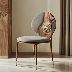 a chair that is sitting in the middle of a room