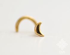 14K SOLID GOLD flat moon stud earring. 3.2 mm long/ 0.8mm thick Perfect for a variety of piercing locations: nostril / lobe / 3rd, 2nd hole earring / tragus / conch / helix / cartilage ---> Features: ♦ Material: 14k GOLD ♦ Earring size: length: 3.2*1.8 mm ♦ ♦ Wire thickness: Select your preference in the gauge at the top right of this page. available in 16/18/20/22 gauge = 1.2/1/0.8/0.6 mm. Gauge: the thickness of the wire the smaller the gauge the thicker the earring shaft is. 16 gauge - 1.2 Minimalist Gold Cartilage Earrings With Moon Charm, Gold Minimalist Cartilage Earrings With Moon Charm, Minimalist Moon-shaped Cartilage Earrings, Minimalist Gold Crescent Cartilage Earrings, Minimalist Pierced Yellow Gold Nose Studs, Minimalist Yellow Gold Nose Studs, Gold Minimalist Pierced Nose Studs, Minimalist Gold Nose Studs, Moon Nose Stud