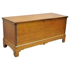 an old wooden chest sitting on top of a white background