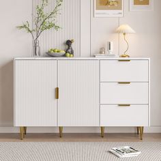 a white and gold sideboard in a living room