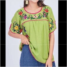 Top Flower Embroidery Muti- Color Style. * A Short Sleeve Top U Neck Made Of 100% Cotton, Special Designed With Hand Crochet Work At Neck Arm And Bottom Top. Delicate Handmade Embroidered At Front And Back. * Hand Washed And No Disinfecting Chemical. * Made In Thailand. Casual Green Embroidered Top With Floral Detail, Bohemian Green Top With Embroidered Hem, Green Casual Embroidered Top, Bohemian Green Embroidered Hem Top, Casual Green Top With Floral Embroidery, Casual Green Floral Embroidered Top, Spring Green Blouse With Embroidered Hem, Green Summer Blouse With Embroidered Hem, Green Embroidered Hem Blouse For Spring