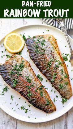 Two fillets of rainbow trout served on a white plate with a slice of lemon. Pan Fried Rainbow Trout, Cooking Rainbow Trout, Fish Batter