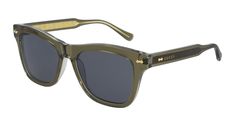 The Decor family, already part of the collection and characterized by the iconic rivets, has now new engravings on the wirecore which can be clearly seen through the transparency of the acetate. Masculine wayfarer acetate shape with wirecore decoration in the temple and enlarged rivets giving a graphic 60s style. Gucci Lettering Logo on temples. The style is available in dark color palette and playful green. The transparency on the temples leaves evidence to the inner wirecore soul, in both silv Luxury Clear Gucci Sunglasses, Gucci Sunglasses With Tinted Lenses For Outdoor, Gucci Sunglasses With Gradient Lenses For Outdoor, Classic Gucci Glass Sunglasses, Gucci Designer Clear Sunglasses, Designer Gucci Clear Sunglasses, Gucci Clear Square Frame Sunglasses, Gucci Clear Glass Sunglasses, Gucci Frames