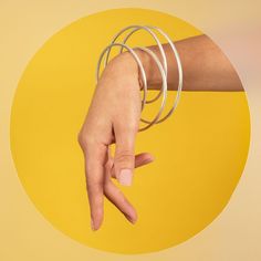 @deelyndesign posted to Instagram: Speaking of photography..... Here is one of my favourite images (and bangles!) from a shoot with @michaelcusick_ photography. Capturing rings and bangles on the body is always a challenge. Hands & arm placement always looks awkward and detached, so we decided to lean into that and make it the theme of the shoot. BIG thanks to Michael and of course.... @rachelkennedy_mua @amber_rosevarley model ~ Vortex bangle in sterling silver #achitecturaljewellery #geo Big Thanks, My Favorite Image, My Favourite, Sustainable Fashion, Amber, Bangles