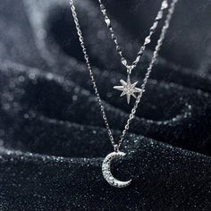 Indulge in the mesmerizing beauty of our double layer celestial pendant necklace, crafted with utmost care from luxurious 925 sterling silver and adorned with sparkling cubic zirconia pave. This exquisite piece features a shorter choker length necklace with a dazzling star charm and a longer crescent moon necklace. Elevate your jewelry collection with this delicate yet captivating moon and star necklace, perfect for everyday wear or as a heartfelt gift for your loved ones. Materials: 925 sterlin Necklace Moon And Star, Silver Celestial Jewelry, Celestial Cubic Zirconia Pendant Necklace, Celestial Style White Gold Necklace With Cubic Zirconia, Silver Double Strand Diamond Jewelry, Celestial Silver Diamond Necklace Gift, Celestial Style Silver Diamond Necklace Gift, Moon And Star Pendant, Cute Promise Rings