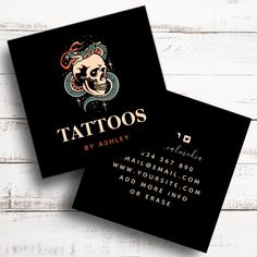 two black business cards with tattoos on them