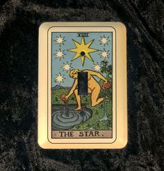 a tarot card with the star on it