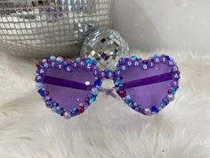 Be the life of the party on your big day with a pair of bedazzled birthday glasses! These glasses are the perfect gift for any birthday celebration and are a unique gift that's sure to shine. All of our glasses are custom made per order, allowing for changes in design, phrasing, and colors. Party proof glasses are the way to go, our glasses are guaranteed to stay intact and if for any reason you aren't satisfied with your purchase we offer a 100% money back guarantee.  *Custom made for each orde Purple Party Sunglasses, Fun Sunglasses As Valentine's Day Gift, Fun Sunglasses For Valentine's Day Gift, Playful Party Sunglasses Personalized, Trendy Personalized Party Sunglasses, Playful Party Sunglasses For Valentine's Day, Playful Sunglasses For Valentine's Day Party, Playful Personalized Sunglasses For Party, Personalized Playful Sunglasses For Party