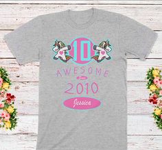 Amazing Since 2010 Funny Dancing Unicorn - Kids Big 10th Birthday Celebration Shirt - Born in 2010 - Aged 10 Years - boy or girl birthday gift! Love this design? Check out my other Kid/Baby Bday Birthday designs -> https://www.etsy.com/shop/craftsofhumanity?section_id=29621589 Know a cute little girl or boy turning 10 years old and born in 2010? Think they are Awesome? Get them this amazing 10 years old customized birthday shirt! Customize on the shirt: Age | Birth Year | Name (optional) This cu Dancing Unicorn, Celebration Shirt, Funny Dancing, Birthday Designs, Unicorn Kids, Cool Gifts For Kids, Birthday Tshirts, Birth Year, Gift Love