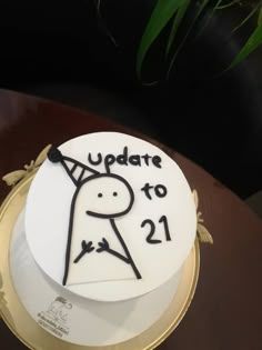 a white cake with the words update to 21 on it