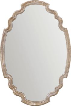 a round mirror with an ornate design on the top and bottom edge, in whitewash