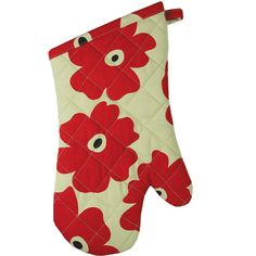 an oven mitt with red flowers on it