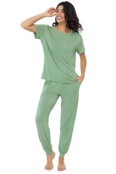 PRICES MAY VARY. 【VISCOSE FABRIC】Our jogger pajama set is made from 95% Viscose made from Bamboo and 5% spandex. Cooler than cotton, Softer than cotton, comfort than silk. 【ZERO RESTRAINTS】This Silky-Smooth Cooling Pajamas Set with excellent drape and elasticity is perfect for an easygoing, unrestrictive feel, fit a range of bodies, so you can unwind while looking your very best. 【CHIC DESIGN FEATURES】This soft pajama top features round neck, short sleeve.Pajamas pant feature adjustable drawstri Pajamas Short, Womens Pjs, Side Pants, Bamboo Pajamas, Round Neck Top, Soft Pajamas, Leg Design, Pajamas Set, Pajama Set Women