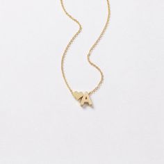 Dainty ♥ initial necklace - a meaningful piece of jewelry that is simple and stylish. D E T A I L S * Single initial size is approximately 5 x 7 mm * Chain is 14k gold fill, sterling silver, or 14k rose gold fill OR 14k gold plate, silver plate, or 14k rose gold plate * Charms are matte gold plate, matte silver plate, or shiny rose gold plate * This listing is for one necklace with two charms P R O M O T I O N * Bridesmaids gifts: message us for a coupon code * New FACEBOOK or INSTAGRAM follower Dainty Letter Initials Jewelry, Dainty Name Initial Pendant Necklace, Dainty Letter-shaped Initials Jewelry, Initial Pendant Charm Necklaces For Mother's Day, Mother's Day Initial Pendant Charm Necklace With Adjustable Chain, Dainty Letter Initial Necklace For Mother's Day, Dainty Personalized Initial Necklace, Initials Pendant Necklace For Mother's Day, Dainty Initial Pendant Charm Necklace For Mother's Day