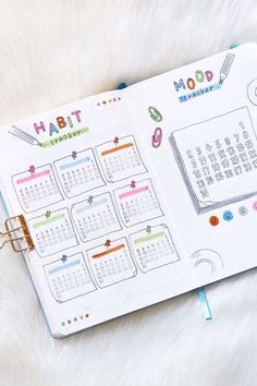 an open planner with the month on it