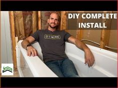 a man sitting in a bathtub with the words diy complete install